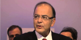 FM hints at GST rollout next year